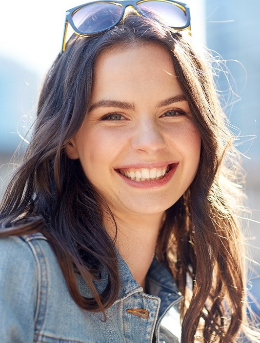 Patient in Whiting smiling after dental crown restoration