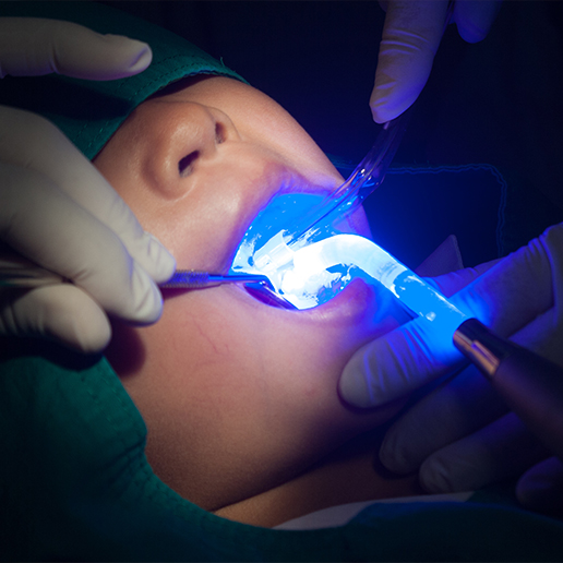 Child receiving dental sealants