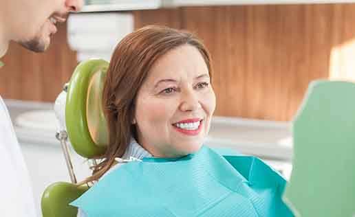 Woman smiling at the dentist
