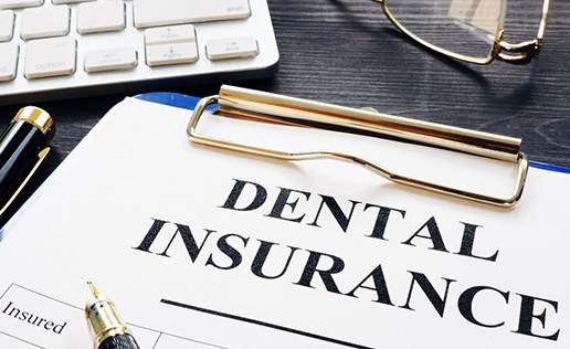 dental insurance form on table
