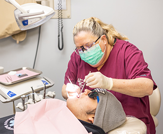 Whiting dentist treating a patient