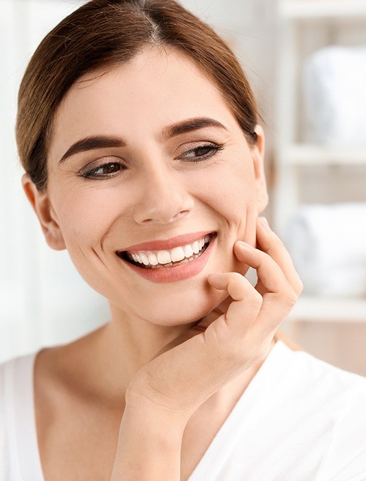 Whiting patient smiling confidently after cosmetic dental treatment 