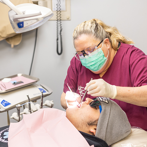 Doctor Royer treating a dental patient